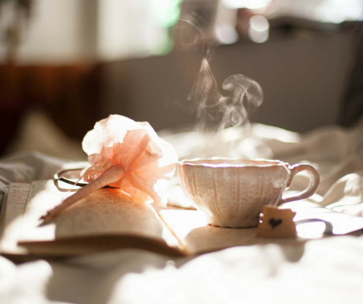 writing with hot tea in morning light