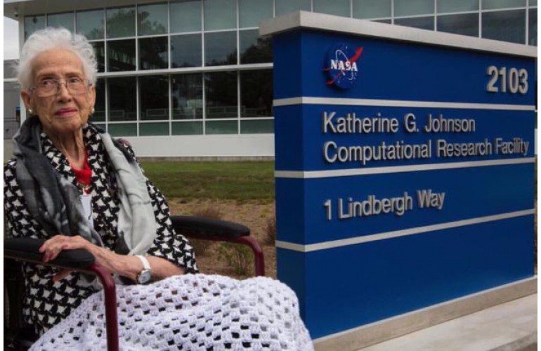 Katherine Johnson in front of the Katherine G. Johnson Computational Research Facility